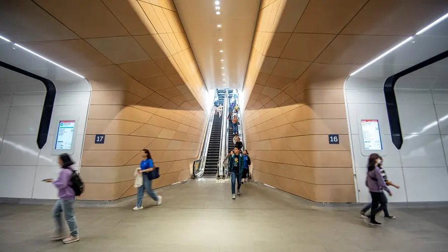 Artist impression of commuters travelling along Central walk at Sydney Metro's Central Station 