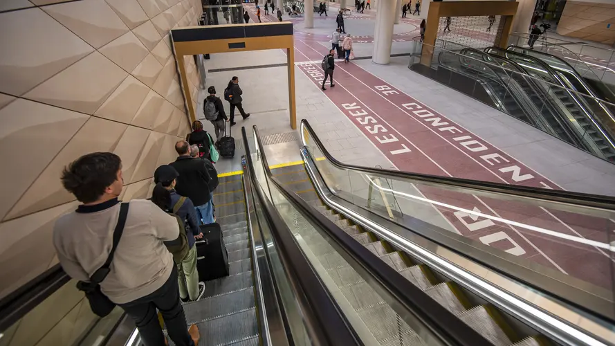 Commuters using an elevator in North South Concourse of Central Station