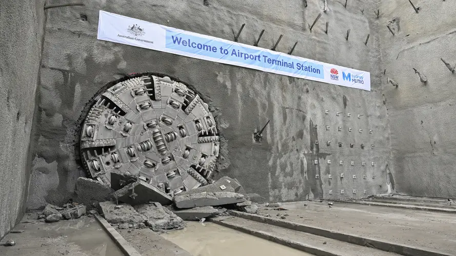 TBM Eileen crushed through a wall of rock to arrive at the Airport Terminal metro station site