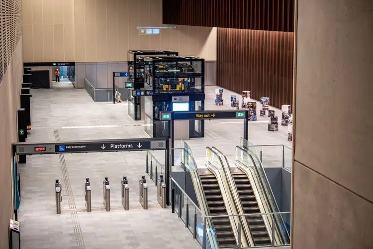 Platforms at Waterloo Station depicting escalators and lifts