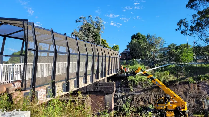 Work is going on with a crane on the T3 Bankstown line