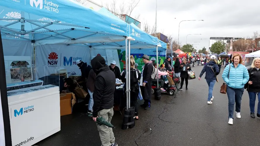 Blue marquees are lined up for a Sydney Metro event