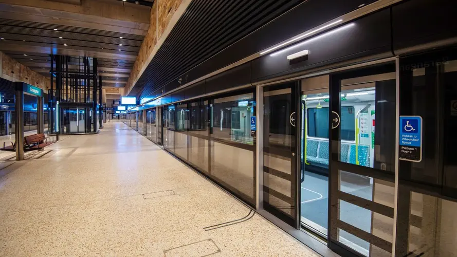 Empty Metro Platform with platform screen doors opening into the Metro train