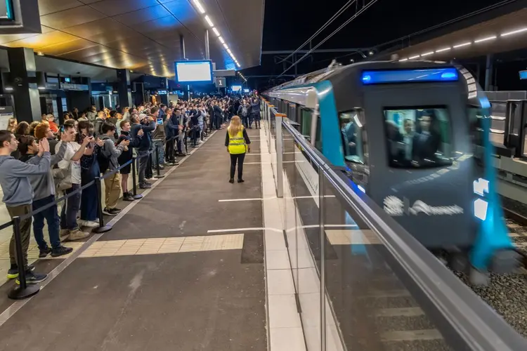 People waiting at the Sydenham Station on the City and Southwest Opening