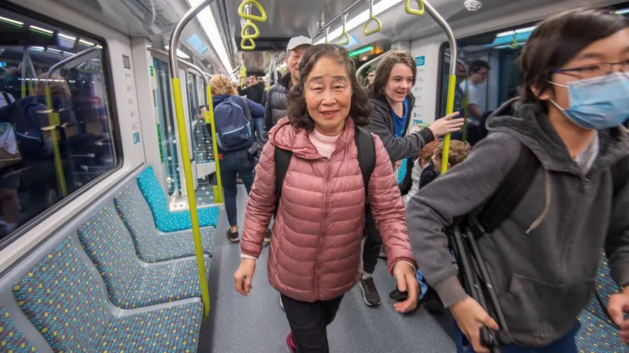 Passenger walking in the newly opening Metro in the city line